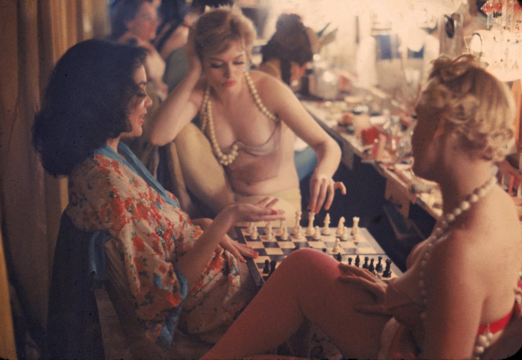 Showgirls playing chess between shows at Latin Quarter Nightclub